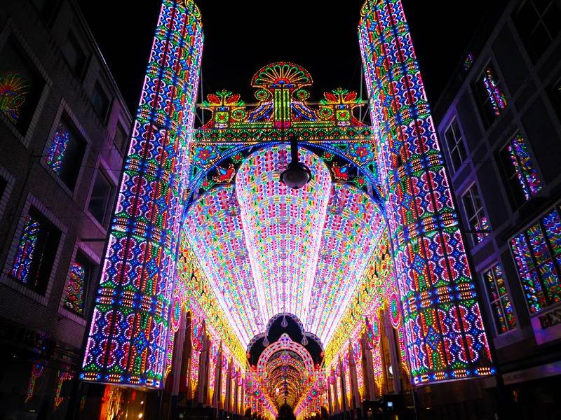 Luxury escort at the Ghent Light Festival among the illuminated streets