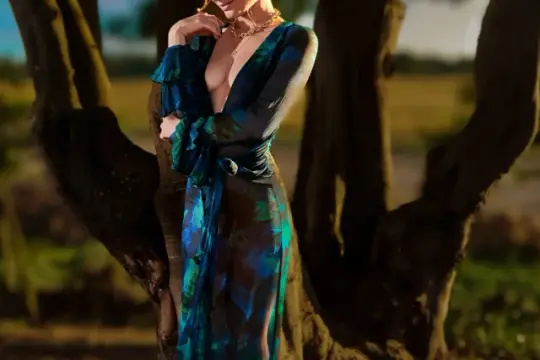 A girlfriend experience escort companion dressed for an elegant evening with Top Companions