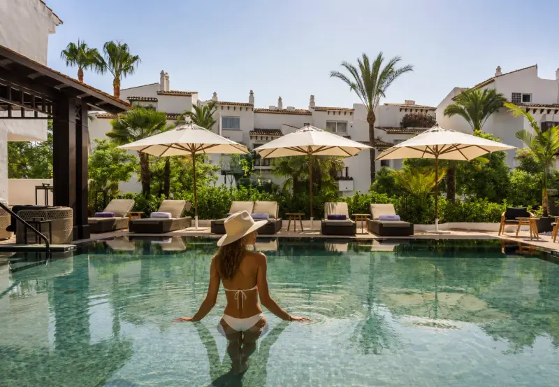 High-class escort companion at the Nobu Hotel Marbella pool on the Costa del Sol
